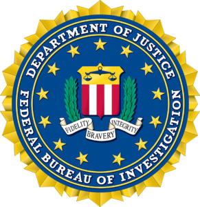 The logo of the Federal Bureau of Investigation featuring an eagle and a shield with stars and stripes.